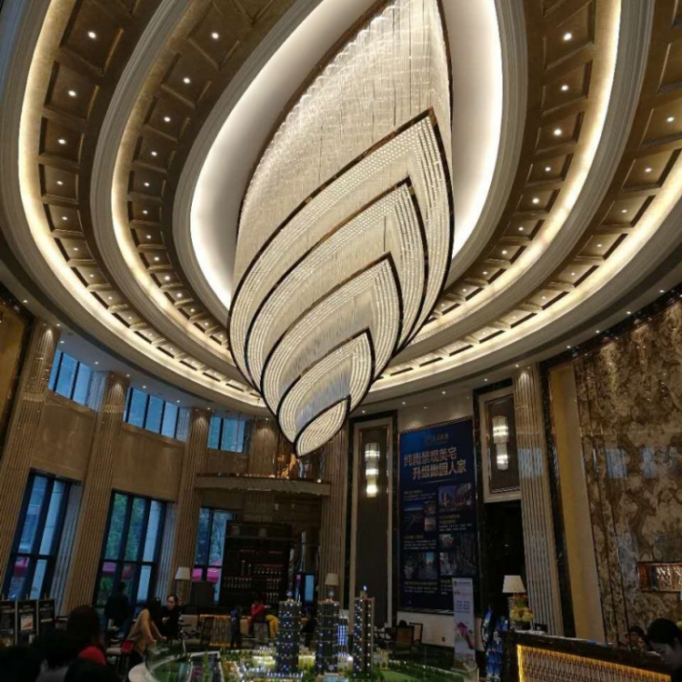 Wide view of the space with the leaf form crystal lobby ceiling